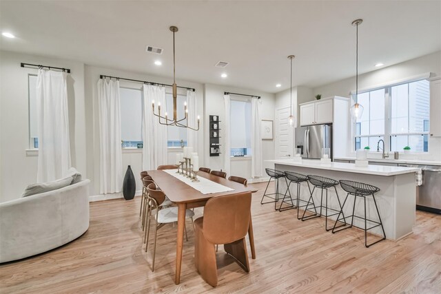 dining area featuring light hardwood / wood-style floors