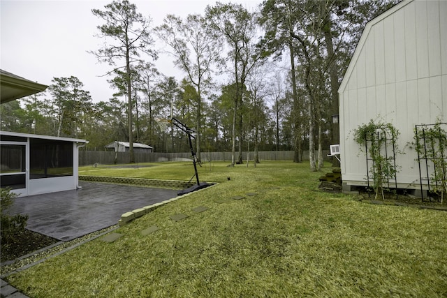 view of yard with a patio and a sunroom