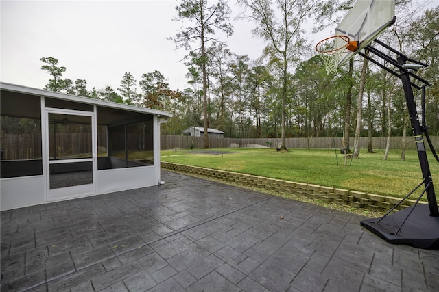 view of patio / terrace with a sunroom