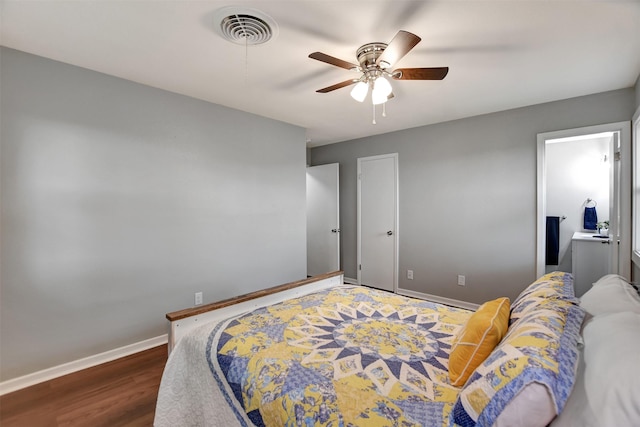 bedroom featuring dark wood-type flooring and ceiling fan