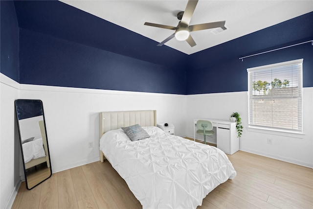 bedroom featuring ceiling fan and hardwood / wood-style floors