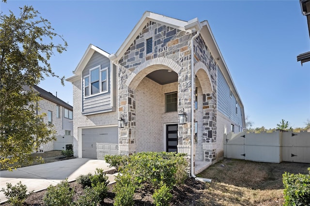 view of front of property with a garage