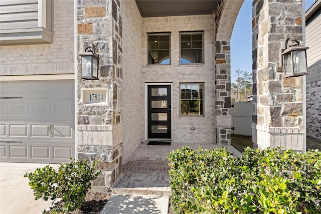 property entrance featuring a garage