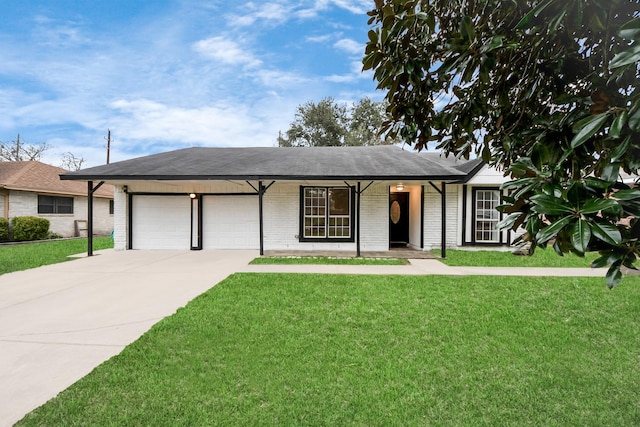 single story home featuring a garage and a front lawn