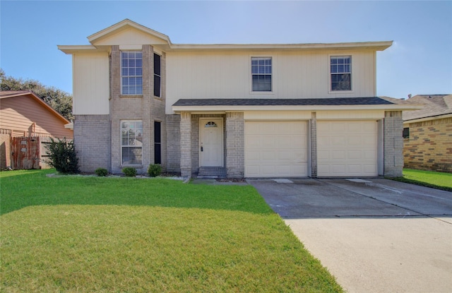 view of front of property with a garage and a front lawn