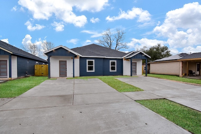 ranch-style house with a front yard