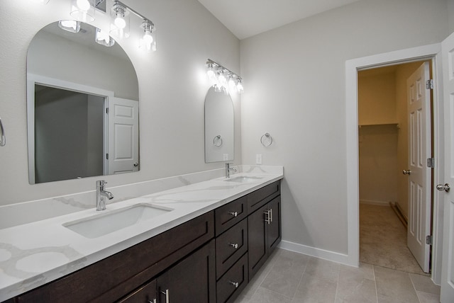 bathroom featuring vanity and tile patterned flooring