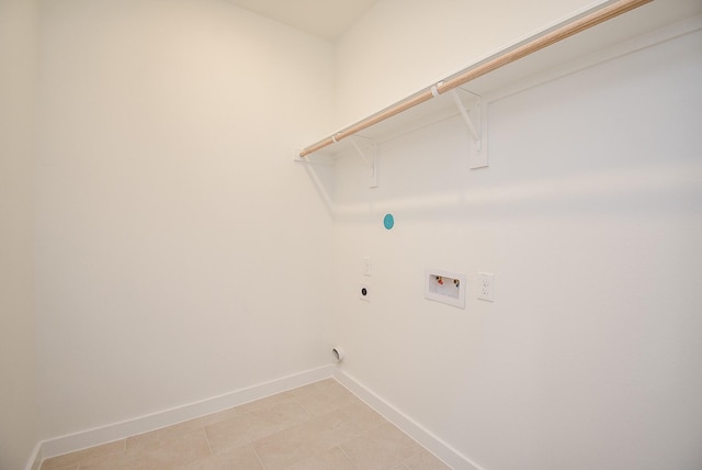 laundry room with electric dryer hookup and washer hookup