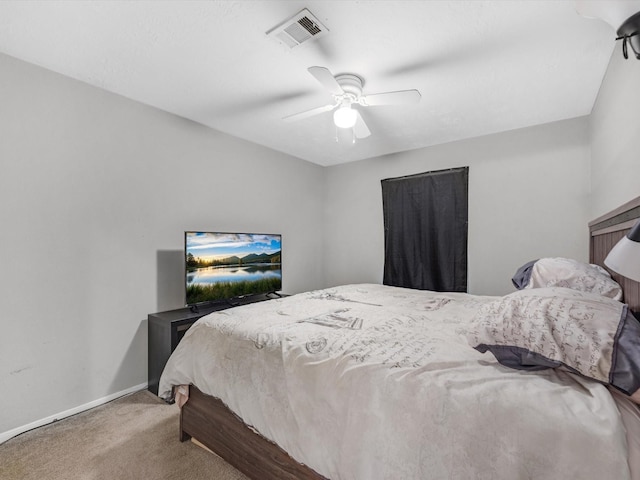 bedroom with ceiling fan and carpet