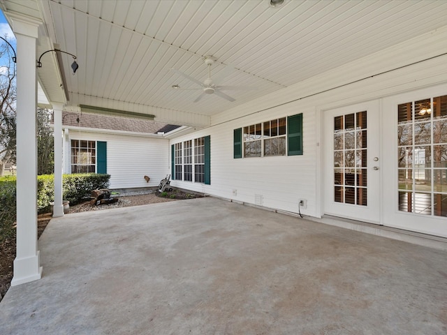 view of patio / terrace featuring ceiling fan and french doors