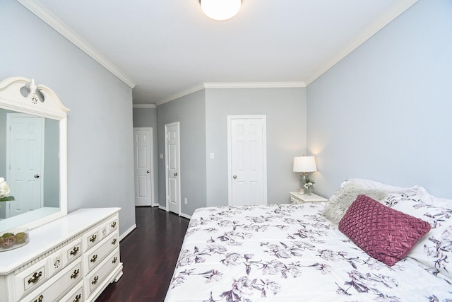 bedroom featuring crown molding and dark hardwood / wood-style floors