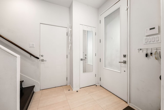 view of tiled foyer entrance