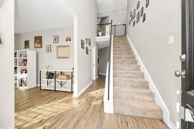 foyer with hardwood / wood-style flooring