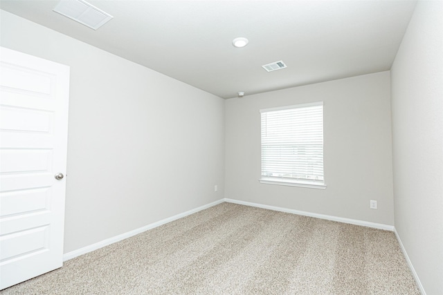 empty room featuring carpet floors