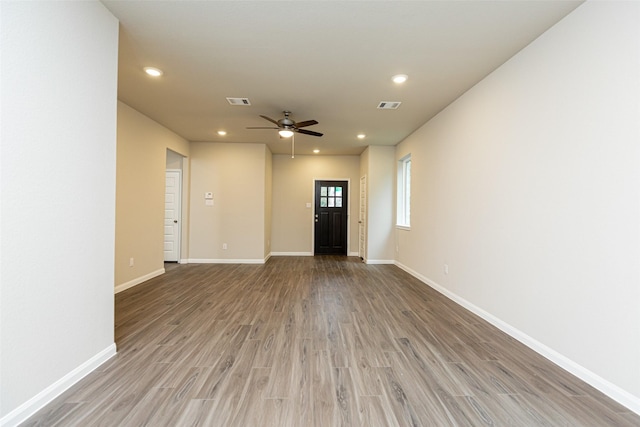 entrance foyer featuring ceiling fan and light wood-type flooring