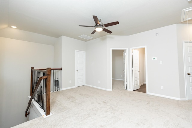 carpeted empty room with ceiling fan