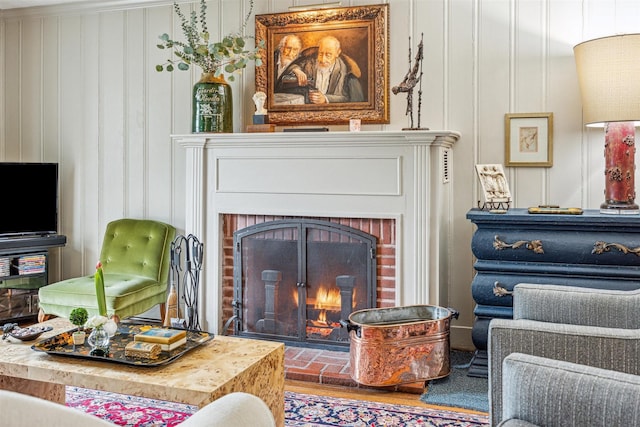 sitting room featuring a fireplace