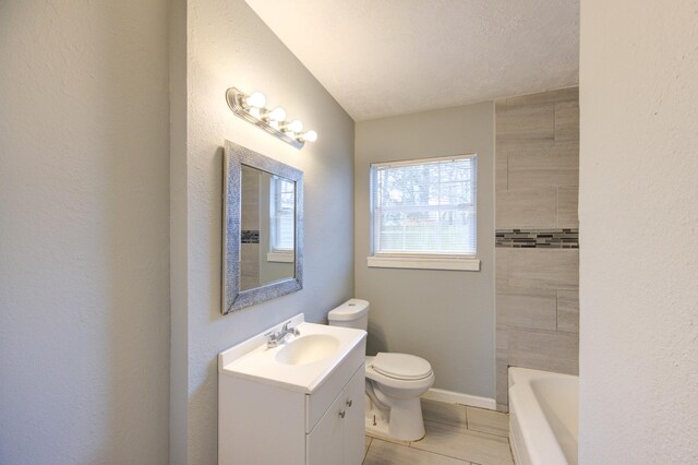 full bathroom featuring toilet, vanity, baseboards, walk in shower, and a bathtub