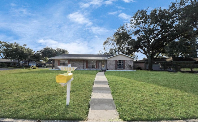 ranch-style house with a front yard