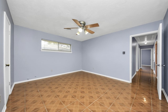 unfurnished room with ceiling fan