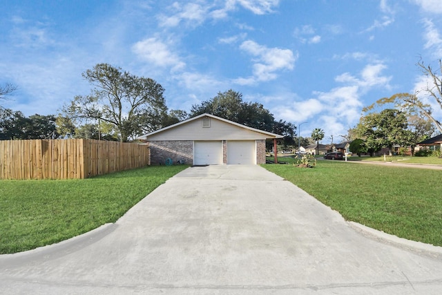 view of home's exterior featuring a yard and a garage