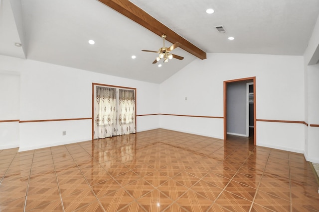 spare room with ceiling fan and vaulted ceiling with beams