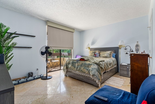 bedroom featuring a textured ceiling