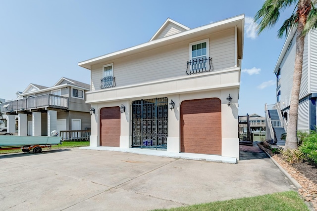 view of front of property with a garage