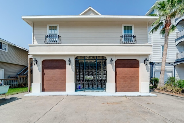 view of front of property with a garage