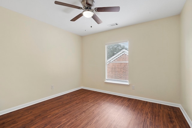 empty room featuring wood-type flooring and ceiling fan