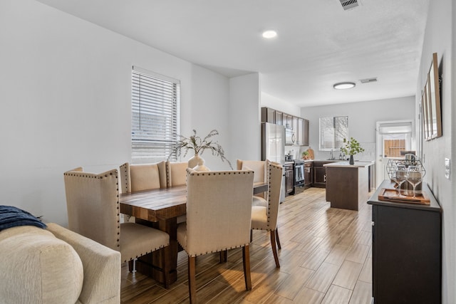 dining room featuring sink