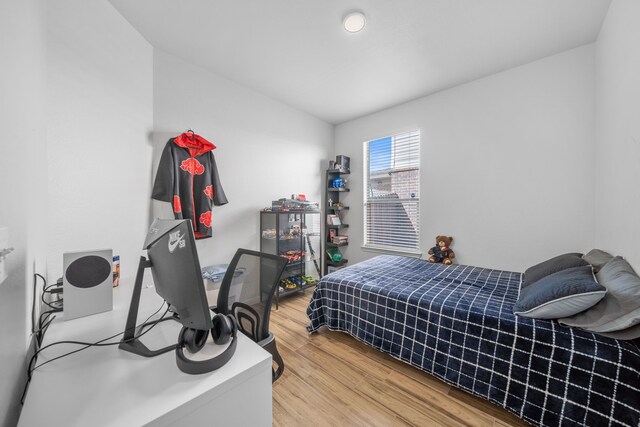 bedroom featuring wood-type flooring