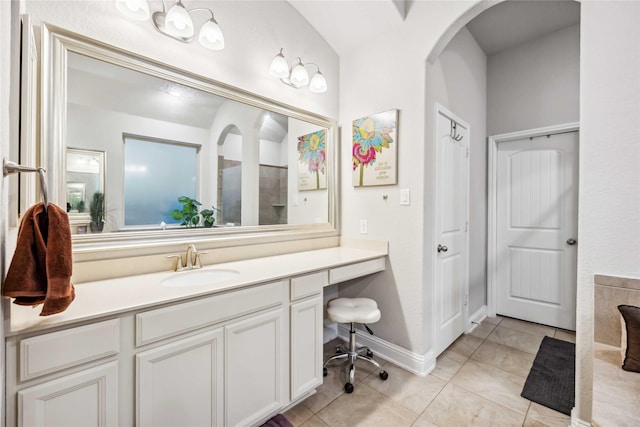 bathroom with vanity and tile patterned floors