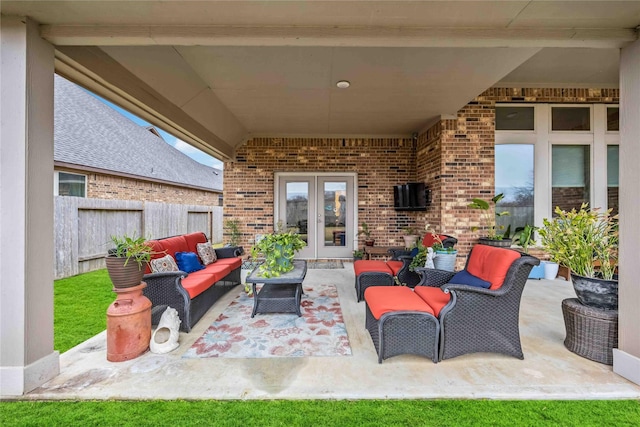 view of patio featuring an outdoor living space and french doors