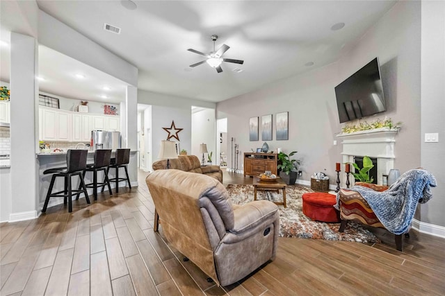 living room featuring ceiling fan