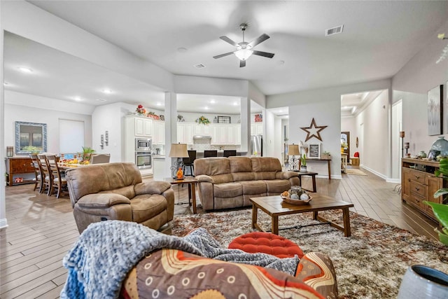 living room with ceiling fan