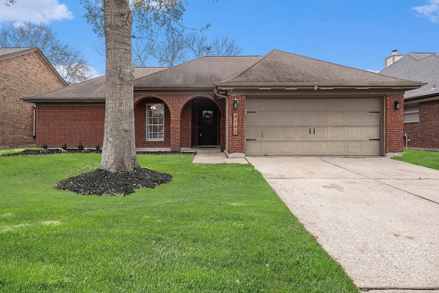 ranch-style house with a garage and a front yard