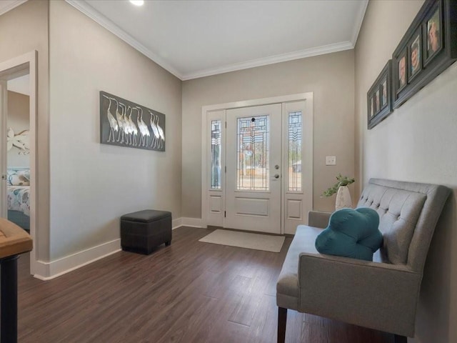 entryway with ornamental molding and dark wood-type flooring