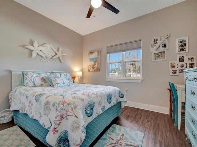 bedroom featuring dark wood-type flooring and ceiling fan