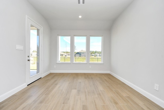 spare room featuring recessed lighting, baseboards, visible vents, and light wood finished floors