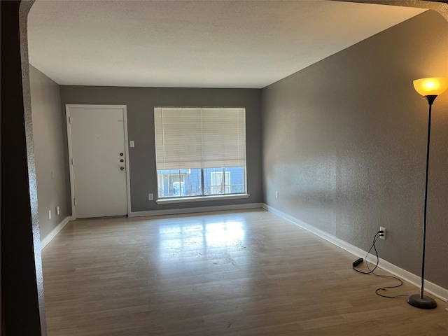 empty room featuring light wood-type flooring