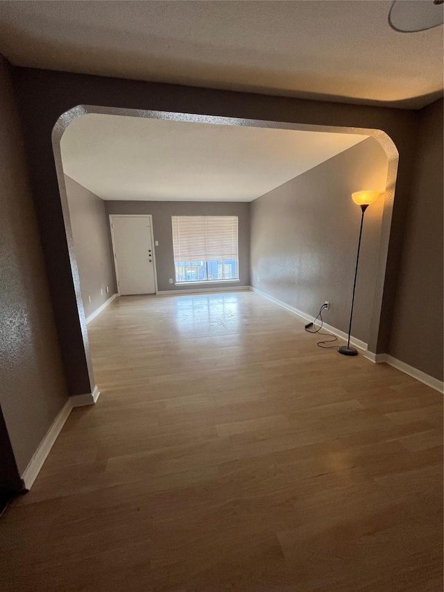 corridor featuring hardwood / wood-style flooring