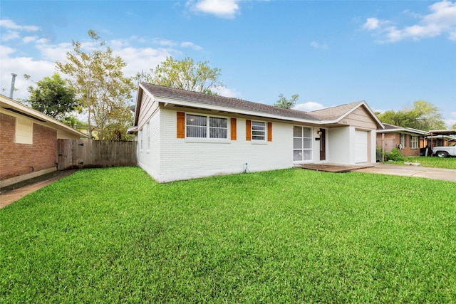 single story home with a garage and a front yard