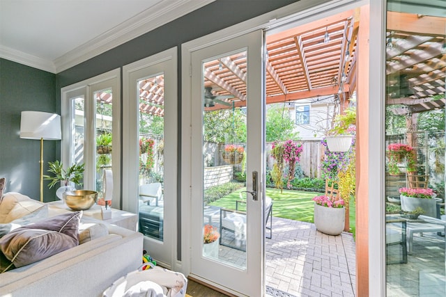 doorway to outside featuring ornamental molding