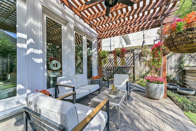 view of patio with fence, outdoor lounge area, and a pergola