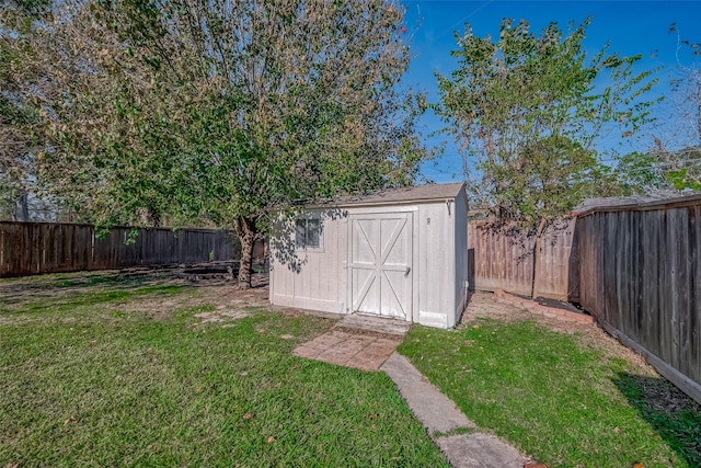 view of outdoor structure with a lawn