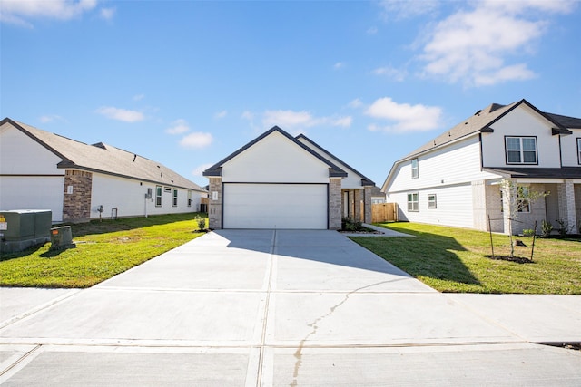 view of front of property with central AC unit and a front lawn