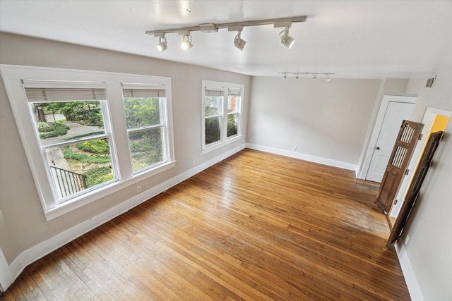 interior space with hardwood / wood-style flooring