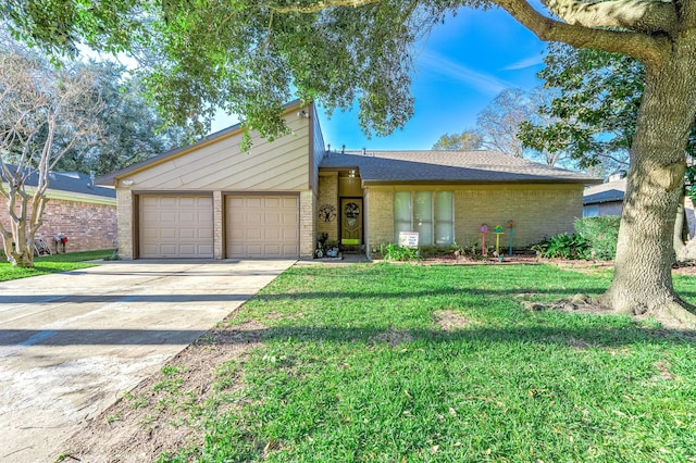 ranch-style house featuring a garage and a front yard