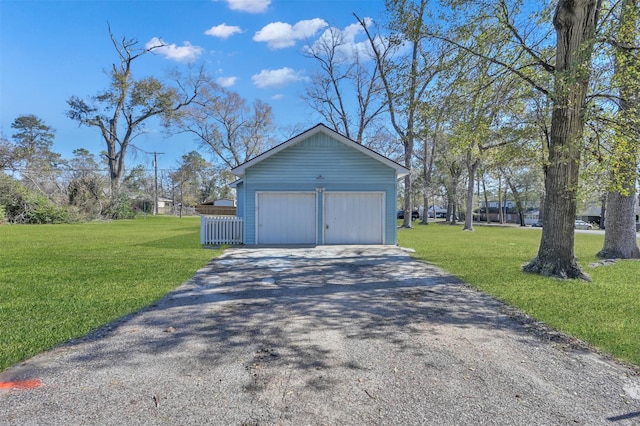 garage with a lawn